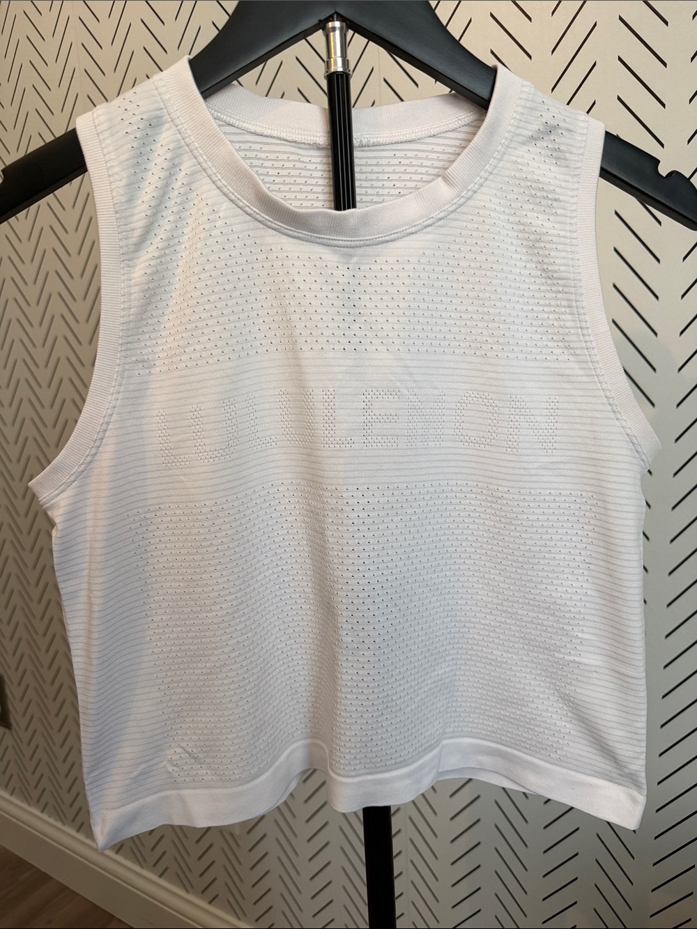 lululemon athletica White Perforated Athletic Tank says” lululemon” on chest